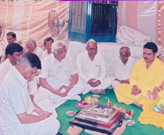 Group puja ceremony with elders